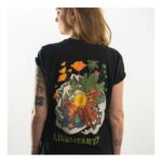 Cameron Monaghan Instagram - Introducing Lionhearts LA Lionhearts is a seasonal release of a tee-shirt, each one designed by a different Los Angeles-based artist. 20% of proceeds will go to California-based charities, with the remainder covering overhead and being put into a fund specifically for personal independent film projects. First up is a design by @nilafaith Nila is a tattoo and visual artist based in Los Angeles. She is also a personal friend and I have known her as a kind, spirited person with a strong sense of self. Lionhearts is about embracing our individual voice and expressing fearlessly, and Nila felt like a perfect fit for this reason. All shirts will be printed in association with @EverpressHQ Everpress is a UK-based company with an eye on sustainability. All shirts are made-to-order which reduces waste and manufacturing byproduct. Everpress places emphasis on sourcing from ethically-accredited suppliers. They comply with strict ethical and environmental standards. All profits will be donated to charity as follows:  5% - P.S. Arts 5% - Wildlife Conservation Network 5% - LA Food Bank 5% - Planned Parenthood LA  Lionhearts has an attitude of wanting to support a better world, not only for now, but for the future. Wildlife conservation to provide biodiverse ecosystems for future generations. Arts education so that children can be exposed to the beautiful and healthy outlet of creativity. The food bank, so that families do not go hungry. And Planned Parenthood, to provide sex education and so that parents can better choose when they would like to bring a child into this world, and do so with a safer start. These organizations have been vetted using Charity Navigator and picked specifically because they seemed to have transparency in their financials. We have also specifically chosen all California-based organizations. To find out more, visit the link in my bio, or head to lionheartsLA.com