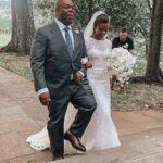 Candace Owens Instagram – That’s my favorite part to rewind my life on. 🎶
When my world got dark, you turned the light on🎶
To the ladies asking— I wore @moniquelhuillierbride for all three of my dresses. I don’t know her personally but I think her gowns are beautiful, timeless, and delicate.
I went with long sleeves down the aisle and for the reception because I think modesty is always en Vogue.. Princess Grace of Monaco was/is the most elegant bride of all time.
A beautiful bride is a kind bride. I’ve seen a lot of women treat their vendors, bridesmaids, make up artists, parents, (and sometimes even their grooms) terribly leading up to their wedding days. The most important thing for both George and I was to make sure every single person that played a role in our wedding, from the vendors to the guests, knew how grateful, excited and blessed we were to have them be a part of our wedding. Our policy was kindness and love throughout the entire process. There are a lot of people I will thank in later posts but first and foremost, to our wedding planner: @justalittleditty Dickie Morris, we love you so much.
From start to finish just the most wonderful person in the entire world.
You are now our planner for everything, forever and always.