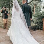 Candace Owens Instagram – That’s my favorite part to rewind my life on. 🎶
When my world got dark, you turned the light on🎶
To the ladies asking— I wore @moniquelhuillierbride for all three of my dresses. I don’t know her personally but I think her gowns are beautiful, timeless, and delicate.
I went with long sleeves down the aisle and for the reception because I think modesty is always en Vogue.. Princess Grace of Monaco was/is the most elegant bride of all time.
A beautiful bride is a kind bride. I’ve seen a lot of women treat their vendors, bridesmaids, make up artists, parents, (and sometimes even their grooms) terribly leading up to their wedding days. The most important thing for both George and I was to make sure every single person that played a role in our wedding, from the vendors to the guests, knew how grateful, excited and blessed we were to have them be a part of our wedding. Our policy was kindness and love throughout the entire process. There are a lot of people I will thank in later posts but first and foremost, to our wedding planner: @justalittleditty Dickie Morris, we love you so much.
From start to finish just the most wonderful person in the entire world.
You are now our planner for everything, forever and always.