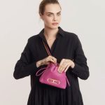 Cara Delevingne Instagram - What song would be inside your bag? #CHInsignia #CHCarolinaHerrera Photography by @felix_cooper