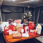 Carlos PenaVega Instagram – 🎄feliz navidad from our familia to yours!🎄 (pretending that the @fsorlando tree is ours for the season 🤣. Swipe to see our awesome boat Christmas!)