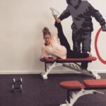 Caroline Flack Instagram - And we’re back ... we’re in prep mode ... @roarfitnessgirl is teaching me to stretch and lift at the same time. (This is not a real exercise) (do not try at home ) (or in the gym ) 😬🙏🏻🤮