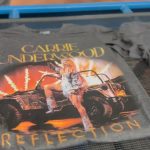 Carrie Underwood Instagram - Hot off the press! 👕 We’ve got some new merch ready for you at #REFLECTION next week! #CUinVegas💎