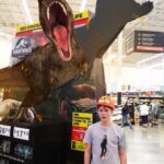 Casey Simpson Instagram - He’s behind me isn’t he? @JurassicWorld #FallenKingdom is out on DVD and digital today!!🤩Go to JurassicWOW.com to open the Jurassic World filter and take photos and videos with AR Dinos!🔥 #Ad Walmart Supercenter Pharmacy