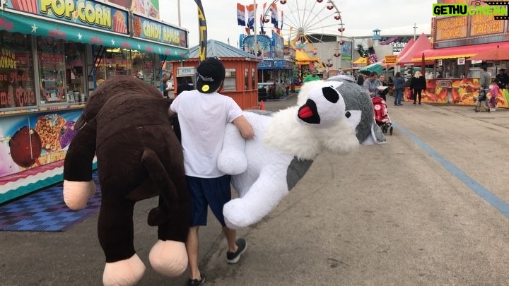 Charles White Jr. Instagram - I’m good at carnival games. I swear each of those animals are 7ft