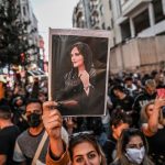 Charlize Theron Instagram - I stand with the women of Iran who are putting their lives on the line to protest their government in the name of #MahsaAmini. No woman should have to fear retaliation, imprisonment or death for making choices about what they wear or how they present themselves to the world. The Iranian government is cutting off access to the internet and deploying their military to try and silence this movement, but we CANNOT let the resilience and courage of the women there go unseen or unheard. We stand with you, and will continue to say her name. Photo: Ozan Kose / Getty