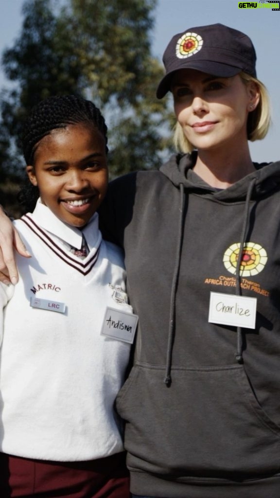 Charlize Theron Instagram - SO proud of my team!!! 2020 was an absolute shitshow –– but did that stop the Charlize Theron Africa Outreach Project or our incredible Partners??? It sure as hell did not 💪📈 Check out @ctaop's 2020 recap video for a peek into all we accomplished, and the immense weight our Program Partners lifted off of those they serve. Then give them a follow to stay in the loop, and head over to ctaop.org to get involved 💛