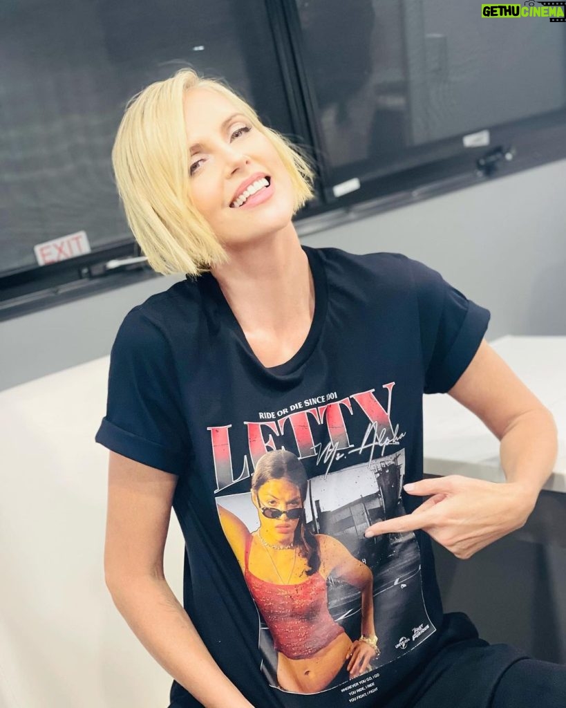 Charlize Theron Instagram - My girl!!!! Say hello to my new favorite shirt –– who the hell wouldn't want a tee with @mrodofficial's perfect face on it?! Join our @thefastsaga fam by snagging a piece of the first ever official Fast merch collection at fastxstore.com. 100% of net proceeds benefit my organization @ctaop to support the health, education and safety of youth in Southern Africa. One week left to get yours! 🔗 Link to buy in bio! #Letty #Cipher #FastX