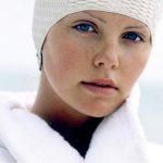 Charlize Theron Instagram - Starting my campaign to bring swim caps back. #tbt