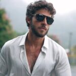 Chay Suede Instagram - Actor and Persolist @chay taking a break from filming to enjoy his new @persol 3302S, inspired by 70s racing movies. Discover the style online now!
