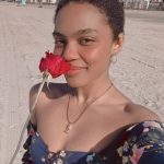China Anne McClain Instagram - a sweetheart gave me a rose at the beach. I hope all his dreams come true ❤️