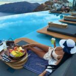 Chloe Khan Instagram - Just book the flight love . No one ever regrets travelling 💙 Cavo Tagoo Santorini