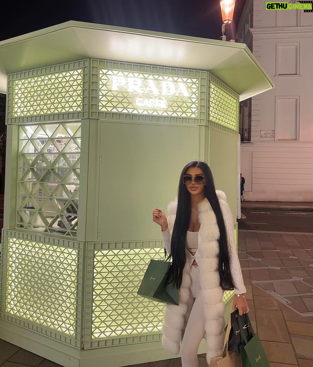 Chloe Khan Instagram - Not willing to accept it’s nearing the end of summer but ready to wear warm clothes 🧸 🤍 Prada Caffè at Harrods