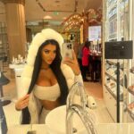 Chloe Khan Instagram - Not willing to accept it’s nearing the end of summer but ready to wear warm clothes 🧸 🤍 Prada Caffè at Harrods