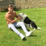 Chris Hughes Instagram - A man's best friend.. Just close your eyes and enjoy the attention Boo.