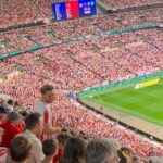 Chris Hughes Instagram - My friend got sent this photo today, and it could be my favourite ever. The weekend was special. Sunderland is special. You don’t get the opportunity to smile often supporting this club, but I’ll look back at this photo in 50 years time, and that smile will be a reminder of one of the best days of my life. Thank you whoever took this, grateful for this memory. Well done lads 🔴⚪️ @sunderlandafcofficial #SAFC