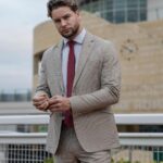 Chris Hughes Instagram - Suited and booted with @houseofcavani! 😏 Get ‘Raceday Ready’ with me! Shop my Cheltenham & Grand National looks online now 🐎 use my code ‘HUGHES20’ at checkout for 20% off everything online! Link in my bio ad 👔🙌🏼