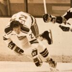 Chris Jericho Instagram - Great chat with the #BabyfaceAssassin and my dad #TedIrvine on @talkisjericho NOW! Teddy’s giving a play-by-play account of the @nyrangers 1972 @nhl Stanley Cup Playoff run! It was probably the biggest moment of his hockey career in New York, and he shares details and stories about his team’s incredible performance from beating @nhlblackhawks and @canadiensmtl to losing the Finals at home to @nhlbruins in 6 games. Teddy talks about the Rangers’ stacked lineup at the time which included goalies Ed Giacomin and Gilles Villemure, Billy Fairbarn, Rod Gilbert, Brad Park, Jean Ratelle, Rod Seiling, Pete Stemkowski, Walt Tkazcuk, and team captain, Vic Hadfield. He remembers what it was like to face Bobby Orr and Phil Esposito on the ice, and what it was like to prevent Boston from winning the Cup in their home rink! He also recalls his trade from LA to New York, negotiating his own contract, winning over the tough as nails New York fans, dressing for success, the prestige of playing in @thegarden, living in Manhattan in the early 70s and so much more! Check out this truly great show on @spotify and @applepodcasts NOW!, @siriusxm, @siriusxmfightnation Madison Square Garden- New York City