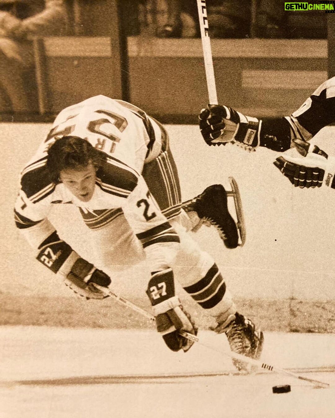 Chris Jericho Instagram - Great chat with the #BabyfaceAssassin and my dad #TedIrvine on @talkisjericho NOW! Teddy’s giving a play-by-play account of the @nyrangers 1972 @nhl Stanley Cup Playoff run! It was probably the biggest moment of his hockey career in New York, and he shares details and stories about his team’s incredible performance from beating @nhlblackhawks and @canadiensmtl to losing the Finals at home to @nhlbruins in 6 games. Teddy talks about the Rangers’ stacked lineup at the time which included goalies Ed Giacomin and Gilles Villemure, Billy Fairbarn, Rod Gilbert, Brad Park, Jean Ratelle, Rod Seiling, Pete Stemkowski, Walt Tkazcuk, and team captain, Vic Hadfield. He remembers what it was like to face Bobby Orr and Phil Esposito on the ice, and what it was like to prevent Boston from winning the Cup in their home rink! He also recalls his trade from LA to New York, negotiating his own contract, winning over the tough as nails New York fans, dressing for success, the prestige of playing in @thegarden, living in Manhattan in the early 70s and so much more! Check out this truly great show on @spotify and @applepodcasts NOW!, @siriusxm, @siriusxmfightnation Madison Square Garden- New York City