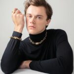Christopher Briney Instagram – honored and excited to be wearing prada’s 100% recycled gold jewelry from their eternal gold collection. thank you @prada for making me feel all pretty 💕

#pradafinejewelry 

photos by: @spencerostrander