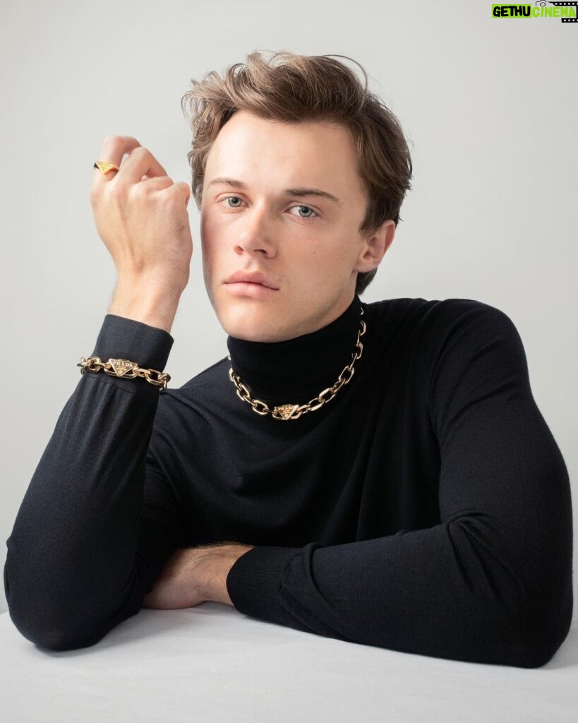 Christopher Briney Instagram - honored and excited to be wearing prada’s 100% recycled gold jewelry from their eternal gold collection. thank you @prada for making me feel all pretty 💕 #pradafinejewelry photos by: @spencerostrander