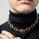 Christopher Briney Instagram - honored and excited to be wearing prada’s 100% recycled gold jewelry from their eternal gold collection. thank you @prada for making me feel all pretty 💕 #pradafinejewelry photos by: @spencerostrander