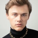 Christopher Briney Instagram - honored and excited to be wearing prada’s 100% recycled gold jewelry from their eternal gold collection. thank you @prada for making me feel all pretty 💕 #pradafinejewelry photos by: @spencerostrander