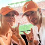Claire Holt Instagram - my first college football game don’t really understand the rules but apparently you have to do this sign or they kick you out