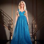 Claudia Schiffer Instagram - Introducing the @ClaudiaSchiffer Barbie Doll in Versace. 💙 Celebrating the iconic supermodel and decade-defining dress she wore in the @Versace F/W 1994 runway show. Now available exclusively on @mattelcreations. #barbie #barbiestyle
