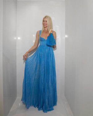 Claudia Schiffer Instagram - Happy to announce one of the first original 90s supermodel Barbie dolls! I had an amazing time working with Mattel to create my Barbie, featuring my favourite @versace runway look of all time. Thank you to all of the teams involved. My limited-edition Barbie is available now 💙