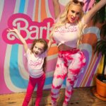 Coco Austin Instagram - Been obsessed with Barbie lately and finally got to visit @barbiecafeofficial with my cousin @statt.hagan. We had a blast, as you can see. Good food and drinks.. I love adventure and now I got my mini to experience things with me! Life is so colorful and beautiful in the barbieworld! THIS IS SO MY THING! #cousins #barbiecafe #barbiecafenyc #barbieworld -swipe Malibu Barbie Cafe New York