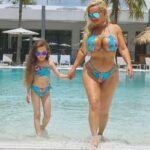 Coco Austin Instagram - Our flight was canceled so we made a detour back in the pool 💦💦💦 Thanks to our friends at @fedeswimwear for our cute matching suits👙 Fort Lauderdale, Florida