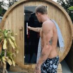 Cody Simpson Instagram - Just elevated my recovery game with @found__space. The infrared barrel sauna is the most elite addition to my backyard haven. Post-swim sauna sessions are go.