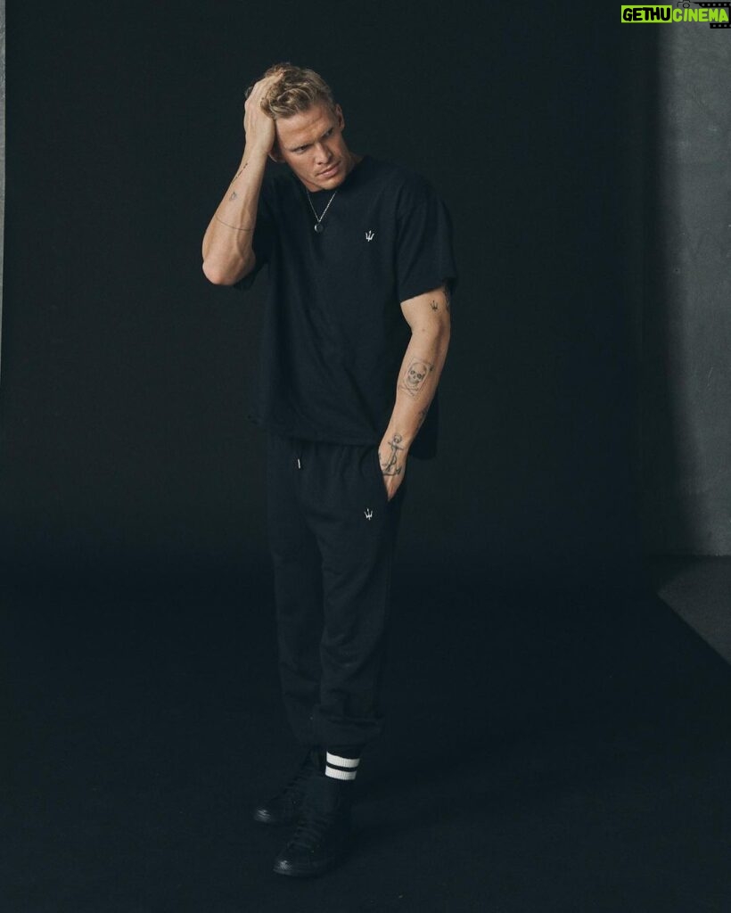 Cody Simpson Instagram - THANKS FOR SUPPORTING & SELLING OUT SOME OF MY FAVOURITE GARMENTS @princeneptune. DESIGNED HERE IN AUSTRALIA BY YOURS TRULY + MY EPIC TEAM OUT OF MELBOURNE. WHAT IS REMAINING OF THE CURRENT COLLECTIONS WILL SOON BE VINTAGE AND NEVER AGAIN MADE. THE ORIGINAL TRIDENT IS IN THE PROCESS OF BEING RE-ENVISIONED AND MODERNISED FOR THE FUTURE OF THE BRAND (WILL EXPLAIN WHY IN TIME ITS KINDA HILARIOUS). SO WEAR YOURS WITH THE OCEAN IN MIND. WE'RE PUTTING IT ALL ON SALE STARTING TODAY PRE BLACK FRIDAY. (Swipe for our new font)