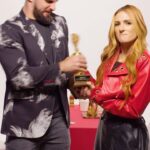 Colby Lopez Instagram – NEW Hot Ones Versus episode with pro wrestling power couple @wwerollins and @beckylynchwwe 🔥 They will either need to tell the truth, or do a battle with some DEATH WINGS. Who will take home the golden chicken wing trophy? 🍗🏆 Find out NOW 👀 Link in bio.
