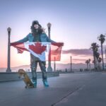 Cole Walliser Instagram - HAPPY CANADA DAY!! I grew up in Canada and being in the gorgeous landscape of Canada helped shape who I am. Here’s a bunch of pics of me in Canada (obvi except for the one of me in Santa Monica holding the flag lol) also who knew I played soccer and had straight hair as a kid?? 😝😝 #canadaday
