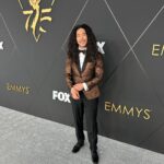 Cole Walliser Instagram - We back baby!! At the Emmy’s in full effect!! So excited to be back shooting GlamBOTs with @eentertainment !! Feeling pretty amazing in my custom @wilvalor tux! 😍😍 first time getting a bespoke suit and i think i now can’t go back! 😂 glam by @penelopevazquez and pics by my first 1st AC Poodle 😜👌🏼 who do you want to see on the GlamBOT today!! ⬇️⬇️ Peacock Theater