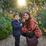 Coleen Garcia-Crawford Instagram - My sweet, gentle boy and his fascination with flowers. 🥹 You are growing up so so fast, and I’m so blessed to be here with you for all of it. 🌸 Paris, France
