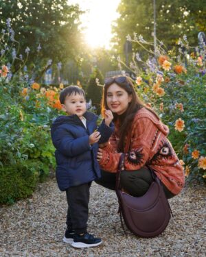 Coleen Garcia-Crawford Instagram - My sweet, gentle boy and his fascination with flowers. 🥹 You are growing up so so fast, and I’m so blessed to be here with you for all of it. 🌸