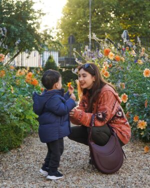 Coleen Garcia-Crawford Instagram - My sweet, gentle boy and his fascination with flowers. 🥹 You are growing up so so fast, and I’m so blessed to be here with you for all of it. 🌸
