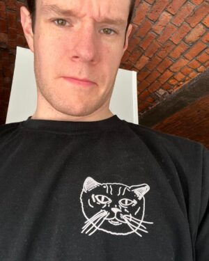 Connor Swindells Instagram - This Saturday is #EarthHour 2024 and to celebrate, I have designed this exclusive tee to raise funds for @wwf_uk. 🌍 
 
I’m delighted to be supporting this project with WWF. We’re all on this beautiful, spinning spaceship that we call Earth together - and it’s up to us to help take care of it. The spirit of my old cat John, who wished he was a lion, wants you to know it’s up to you. 
 
So, head to the link in my bio/story to buy your own John tee. You can also find out how you can take part in Earth Hour this Saturday 23rd of March by heading to www.wwf.org.uk/earth-hour. 💚 
 
Everything is pre-order to make sure there is no waste so the first drop will be available until 28th of March.

(This top sadly does not come with my dogs hair all over it like in this image).