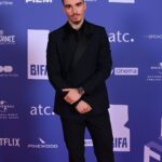 Corey Mylchreest Instagram - @bifa_film What an honour to present @vivianforever_ with the well deserved Breakthrough Performance award. HUGE HUGE HUGE congrats to you and all the incredible nominees ✨✨ Thank you thank you to: @emporioarmani @hollyevawhite @petransellge @bifa_film @loscarlondon #loscarlondon @coeur_de_lion_jewellery L’oscar London