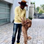 D-Nice Instagram – Love my buddy @theycallmecq. He brings so much joy into our household. 

Also, it was a perfect day to rock my @kennyburns X @puma sneakers and my Xmas @worthandworth hat.