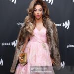 D.J. "Shangela" Pierce Instagram - Pics from the pull up last night 🎉… celebrating @glaad and its Governors Award from the @televisionacad. Thank u @kathyhilton for inviting us into your home and hosting such a fabulous toast to the future of LGBTQ+ representation! More pics to come … photo cred: Stefanie Keenan/Getty Images Wig styling @walliecruz Wig @itssammyhair Makeup by me 💕 Dress @angelayalacouture Shoes @stevemadden Necklace from a sweet fan in a meet n greet (thank u 🫶🏽) Bel Air, California