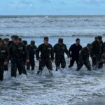 Dan Crenshaw Instagram – Hooyah BUD/S class 364! It was an honor to hit the surf with these 25 men as they savored their last moment of Hell Week. 

Hell Week is the 4th week of the 6 month BUD/S crucible. It is the true gut test that screens out candidates who might quit under pressure. It begins on a Sunday and ends on a Friday morning. This class started with a 115 students, and is now down to 25. Only in very rare cases does anyone quit training after Hell Week. They might be removed for other reasons, but they’ve proven that they’d rather put their body through immense suffering before they quit. After Hell Week, we actually start teaching them skills. It’s a waste of time to teach students SEAL skill sets before they’ve proven themselves in Hell Week.

My BUD/S class was 264. So class 364 is my centennial class, which is why I came out to see them secure Hell Week.

This is the first time I’ve actually seen anyone finish Hell Week outside my own experience back in 2006 (and again in 2007). You can see from the video how much pain these guys have endured. By the end, your body is chafed, frozen to the bone, swollen, and you’re hallucinating on top of that. I wonder if these guys will even remember I was there!

Those are some hard men. They are still well over a year away from becoming SEALs. There’s lots more training and challenges to overcome. But now we know that they have what it takes. Huge congratulations to these guys. 

Follow @navy.seal.swcc for more info