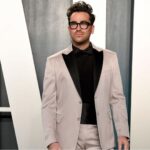 Dan Levy Instagram - This tux makes me emotional. And that’s not just because @mustafathepoet’s beautiful words are embroidered on the sleeve. Thank you @maisonvalentino @pppiccioli for the honor of getting to wear your beautiful clothes. 💕 Styled by @ecduzit Photo: @gettyimages Vanity Fair Oscar Party