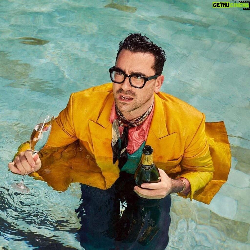 Dan Levy Instagram - Thanks @hollyandres for a very fun/very wet shoot with @vanityfair! 🥂 Styled by @deborahafshani / Grooming by @sydneysollod
