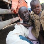 Daniel Gillies Instagram - stephen and his son. imvepi refugee settlement. population: 125,000 i have a voice. so do you. millions of refugees in uganda and south sudan, don't. please HIT THE LINK IN MY BIO. or cut/paste this: represent.com/danielgillies represent have made a kickass T-shirt to support my efforts here in Uganda. all money raised, will be donated to OXFAM; who supply clean water, sanitation, food and incredible care to these refugees. a brutal civil war still rages in South Sudan, but remains disgracefully unspoken about within our media back home. millions are on the brink of famine. millions more have been stripped of everything they have. please join me and the warriors of OXFAM in their campaign to assist the afflicted of this crisis. i'll push this campaign for 2 weeks. let's discuss this issue as long as we all have breath. love and (I really mean this) -- PEACE. Xx dg