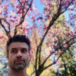 Daniel Gillies Instagram - my amazing girlfriend @msjuliamisaki recently launched the remarkable HIKARI TEA available domestically in the United States. go to hikaritea.com or hit the link in my bio. 100% organic loose leaf japanese tea and i’m not certain it doesn’t have actual magical properties. quite honestly, I consider it one of the essential elements of my day now. zero ‘speediness’ that I often find with coffee; only mental clarity and calm. the quality of the flavor is so beautiful: the subtlety of texture and the rich fullness of the leaf. go to her site and order some or I’ll hunt you down. 🇯🇵❤️🫖 meanwhile here are some pics of Julia and I wandering through Japanese gardens, me reading a book and staring pensively into the distance (not at all staged and YES you can buy that adorable teapot from the site) and Julia looking 🔥 in Paris (also drinking tea). ❤️❤️❤️
