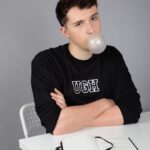 Daniel Howell Instagram - back to class with sass ugh crop sweater / notebook / sarcastic stationery / sequin bag 📝 now on shop.danielhowell.com ✨